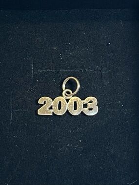 2003 Sterling silver charm for charm bracelet. Simple. Classic. Perfect gift.